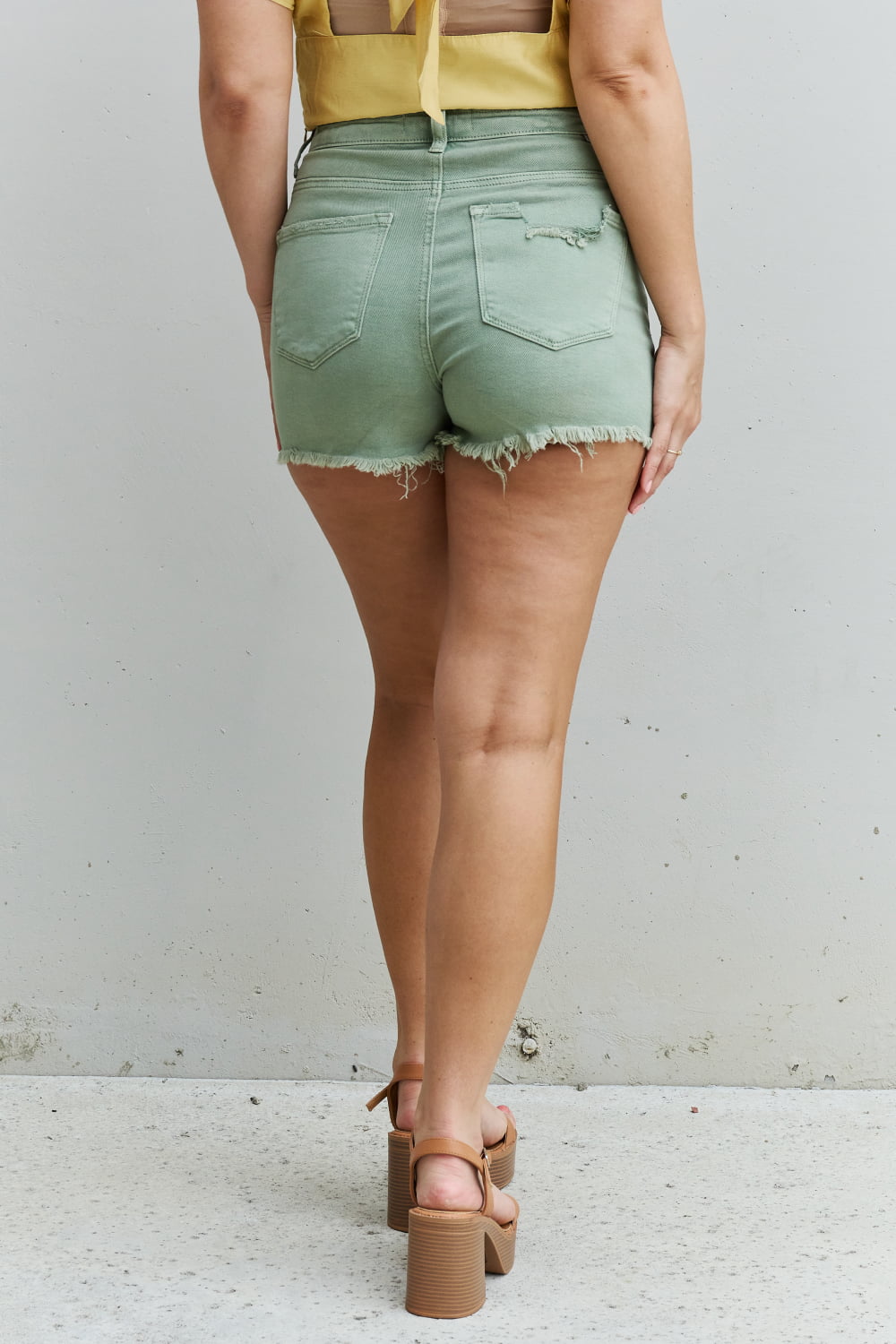 RISEN Katie  High Waisted Distressed Shorts in Gum Leaf