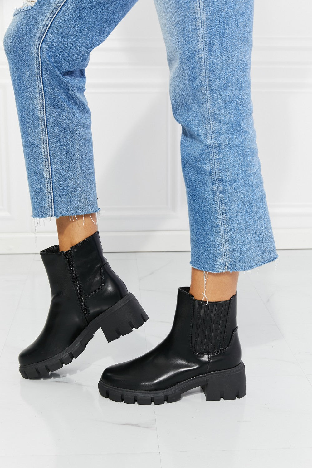 What It Takes Lug Sole Chelsea Boots in Black Trendsi