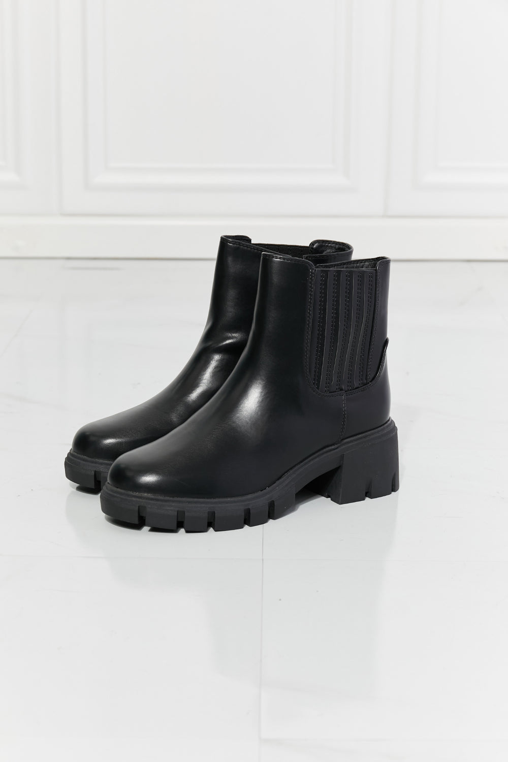 What It Takes Lug Sole Chelsea Boots in Black Trendsi