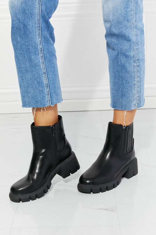 What It Takes Lug Sole Chelsea Boots in Black Trendsi