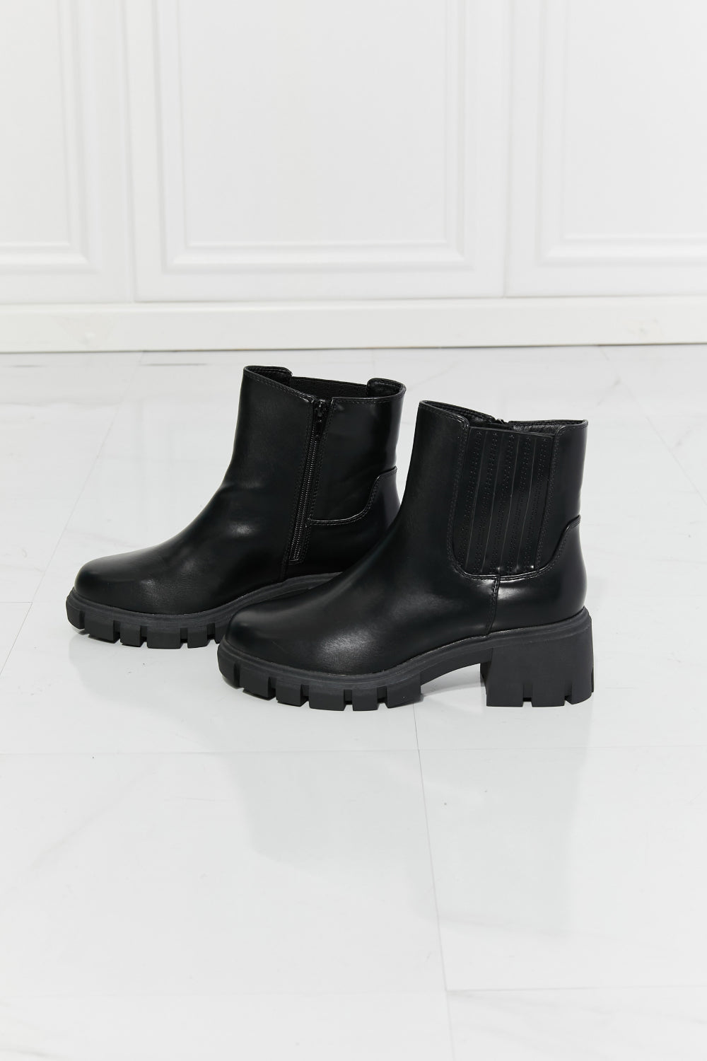 What It Takes Lug Sole Chelsea Boots in Black Trendsi