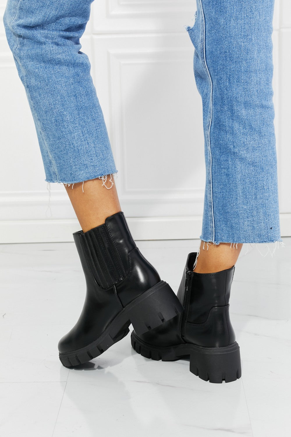 What It Takes Lug Sole Chelsea Boots in Black Trendsi